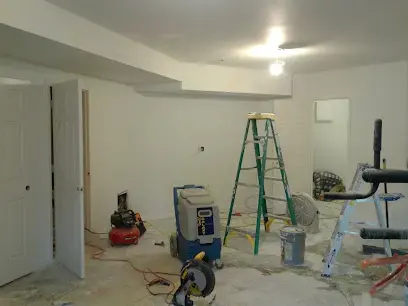 Basement being dried with equipment after wet drywall was removed
